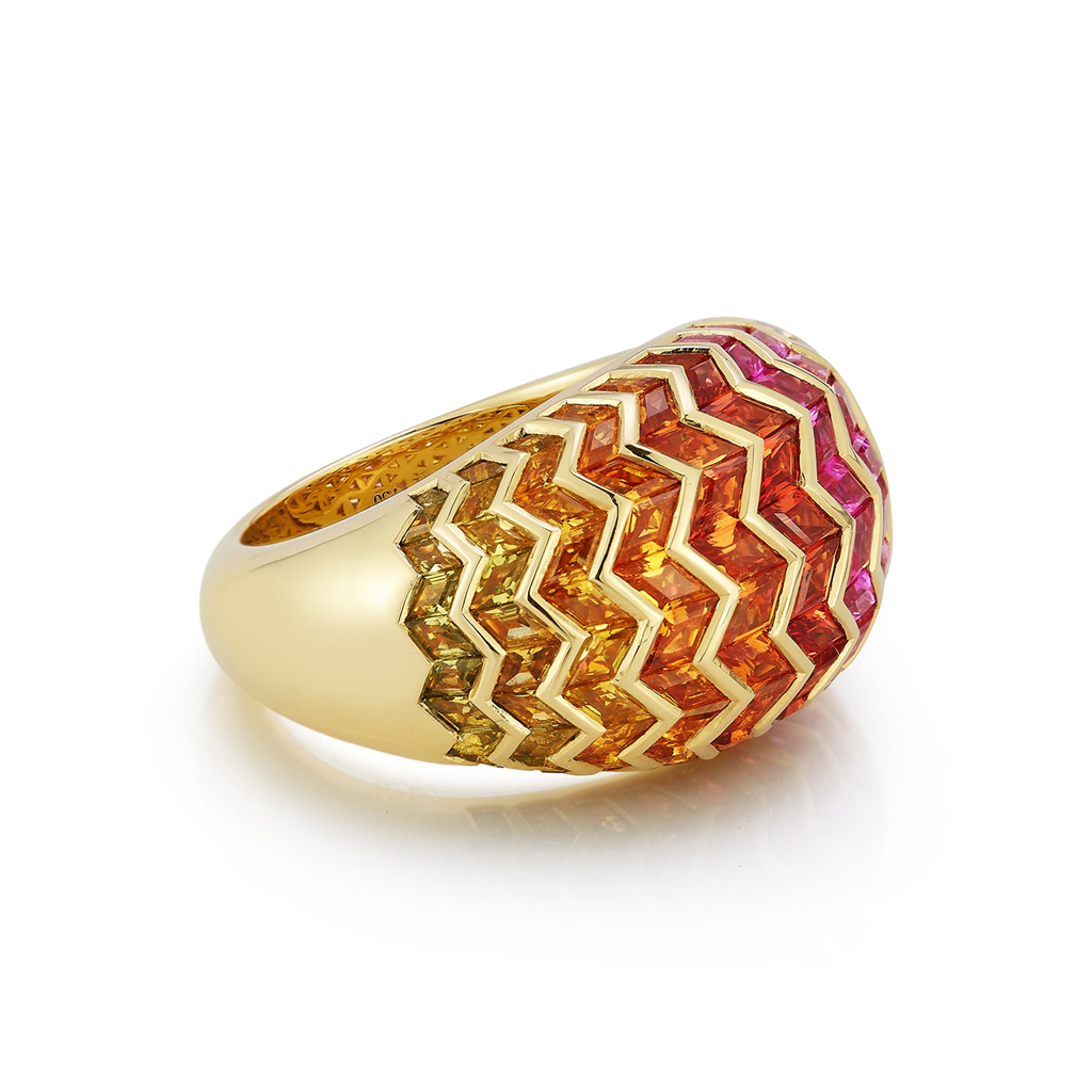 side view of gold and colorful gem ring