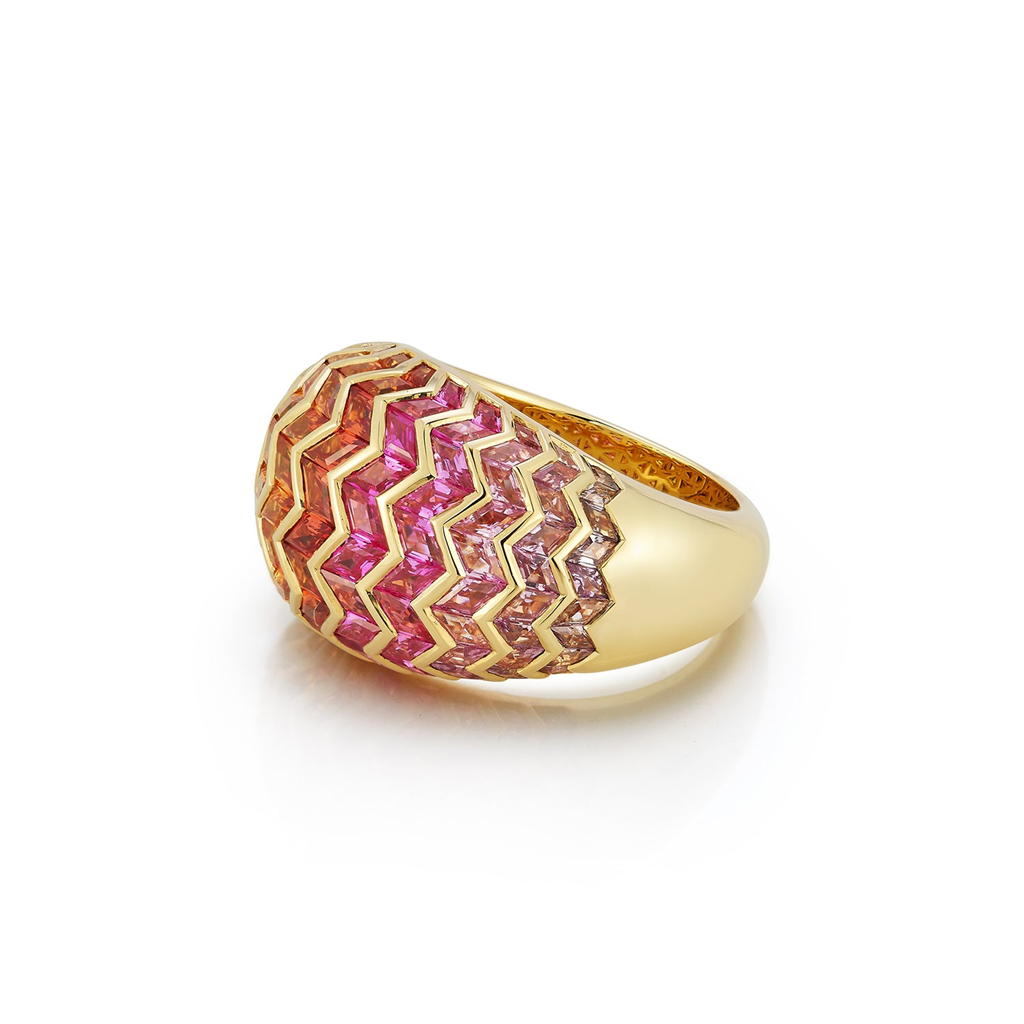 side view of gold and colorful gem ring
