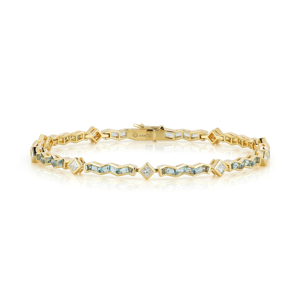 tennis bracelet with diamond and blue gems
