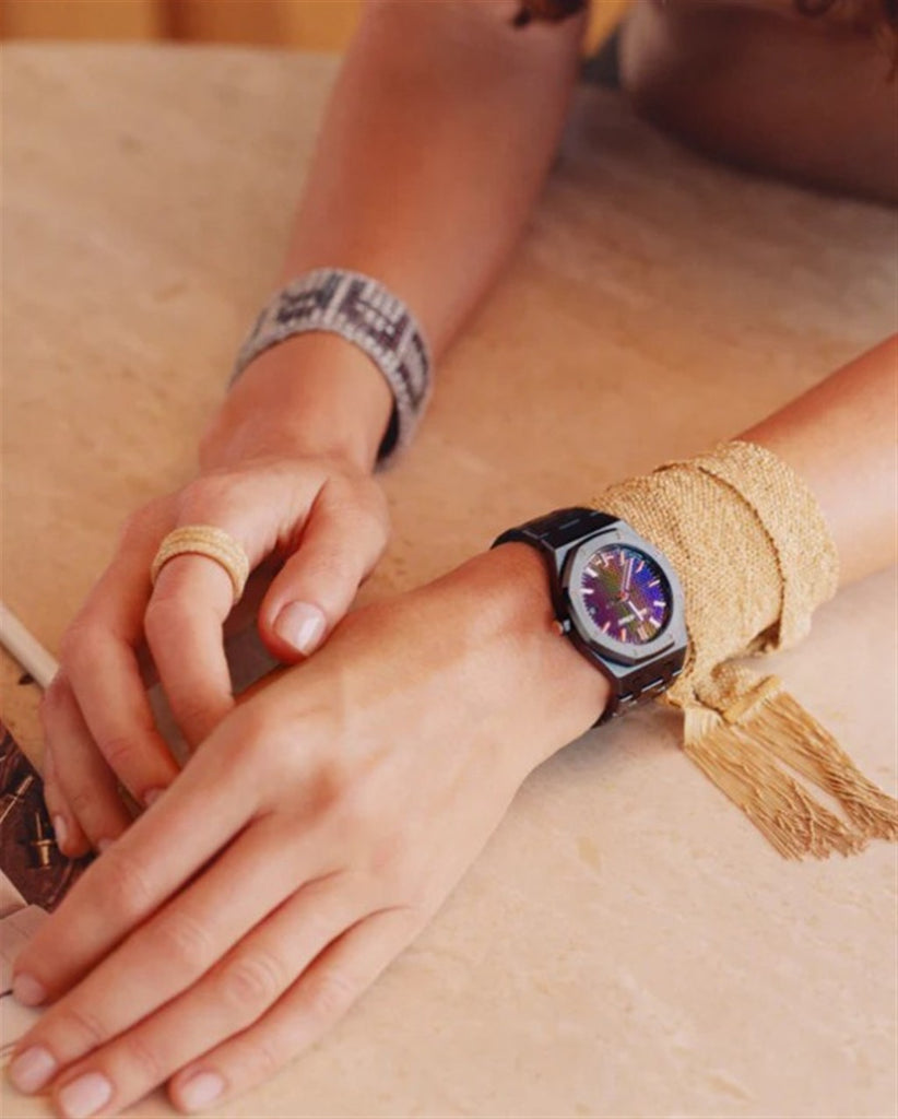 gold woven on model wrist