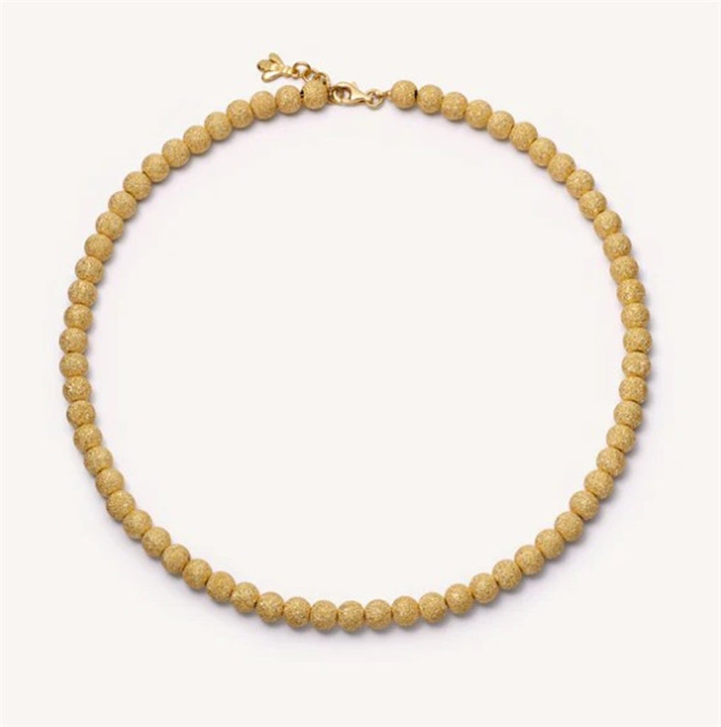 short gold beaded necklace