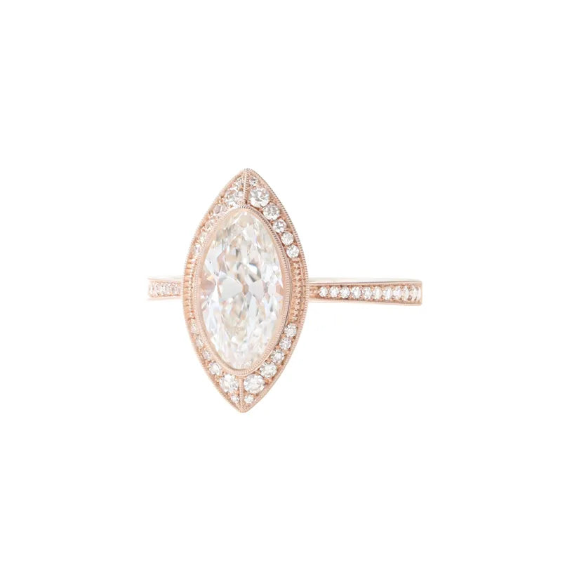 rose gold oval shaped diamond halo