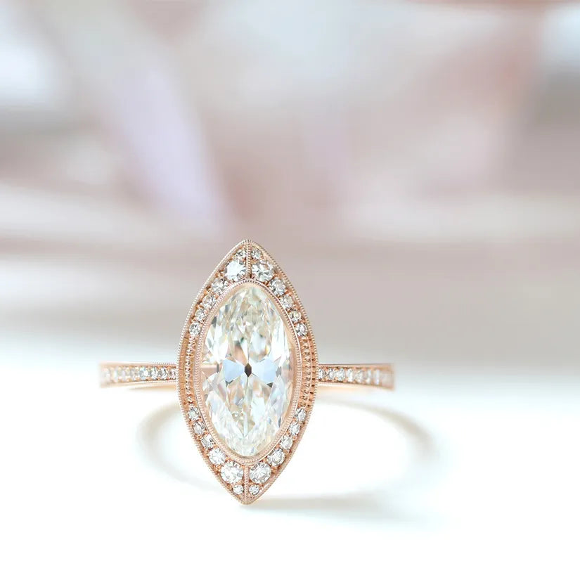 rose gold oval shaped diamond halo