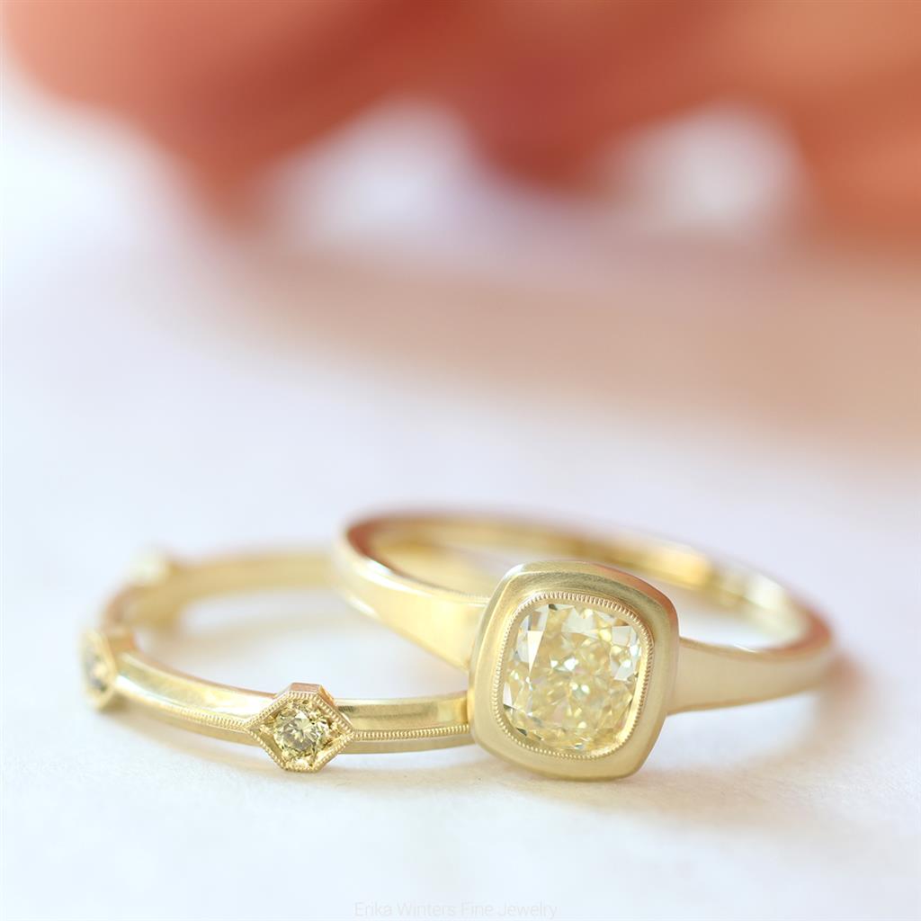 yellow diamond bezeled engagement ring