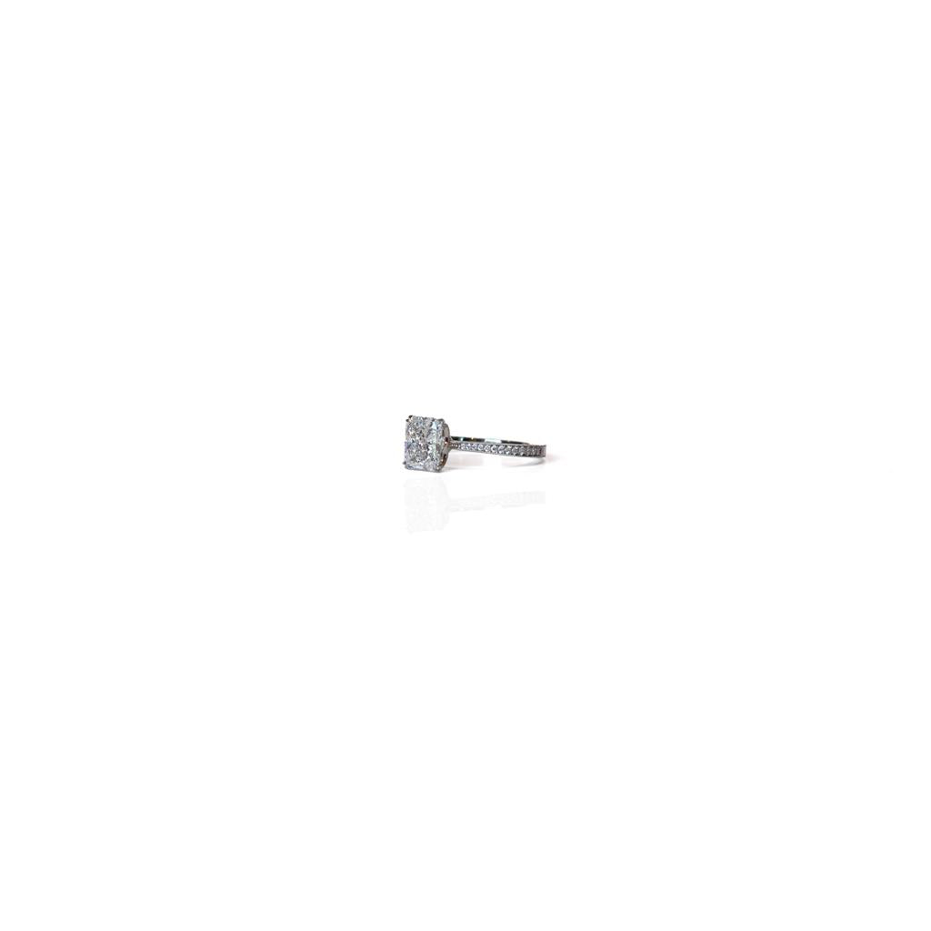 side view brilliant cut rectangle diamond platinum solitaire ring