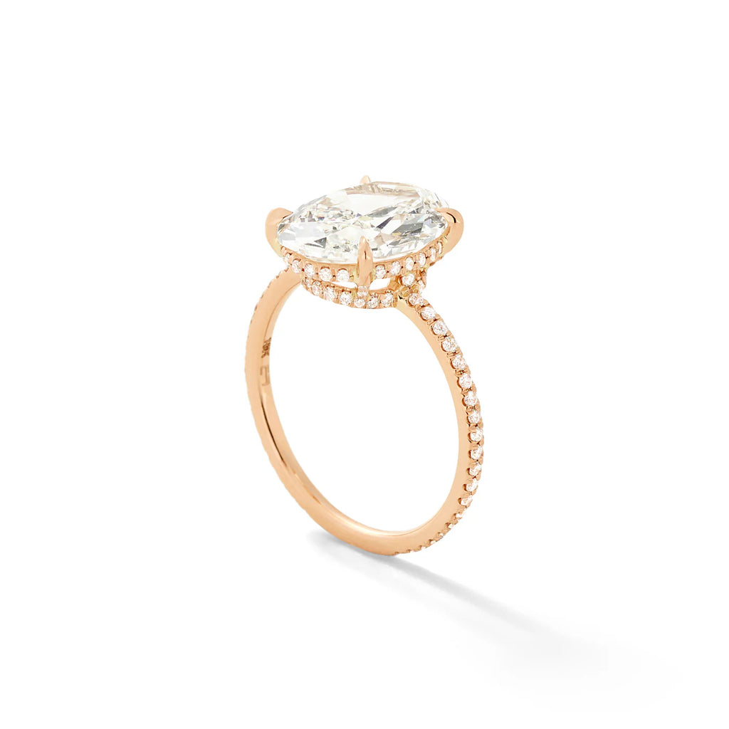 oval diamond and gold ring