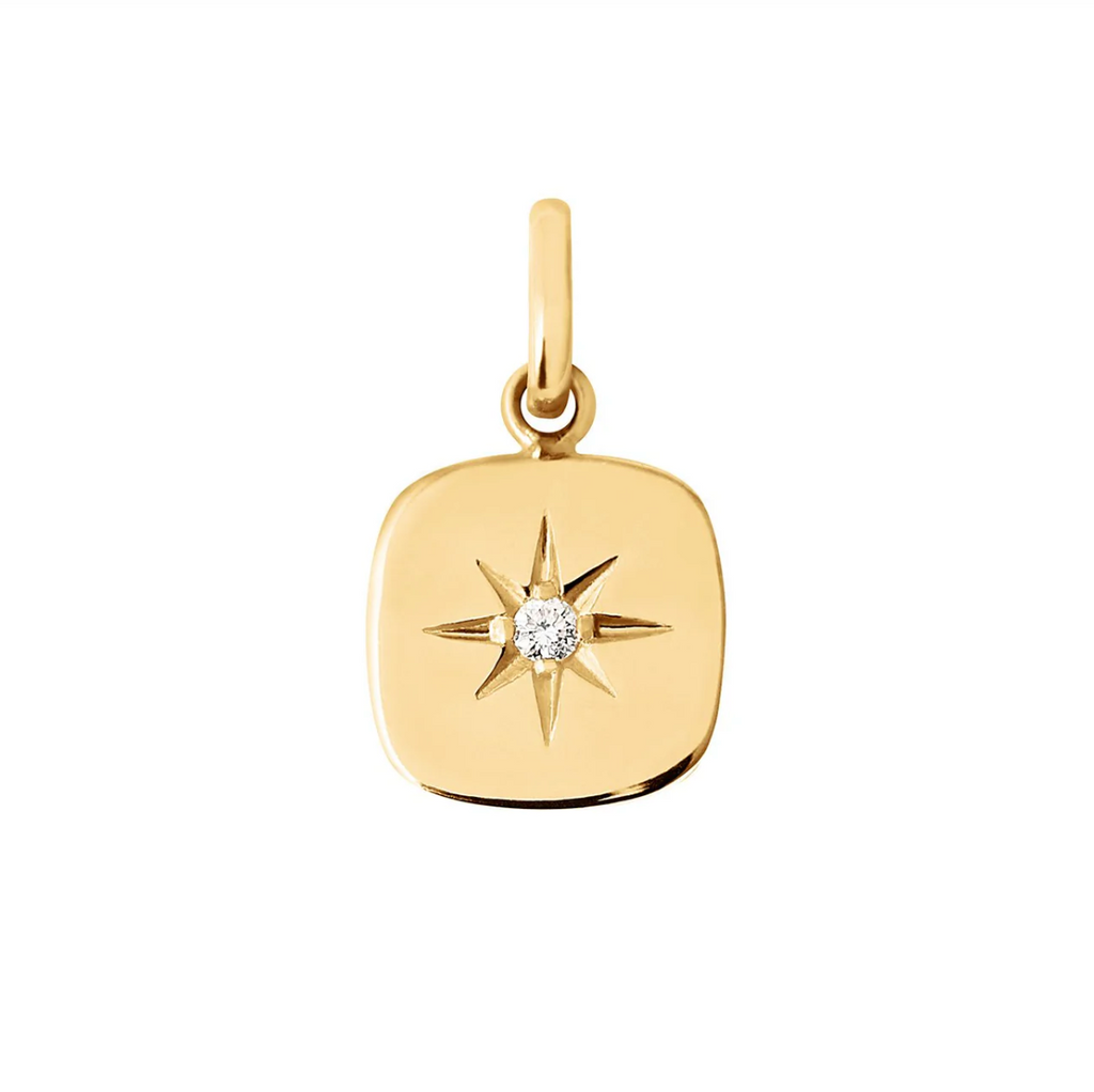 gold pendant with star with diamond in center