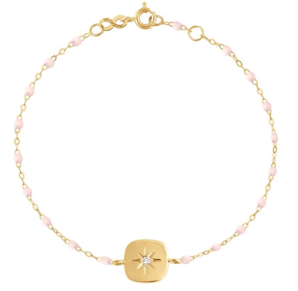 dainty gold and pink beaded bracelet with gold charm with diamond star 