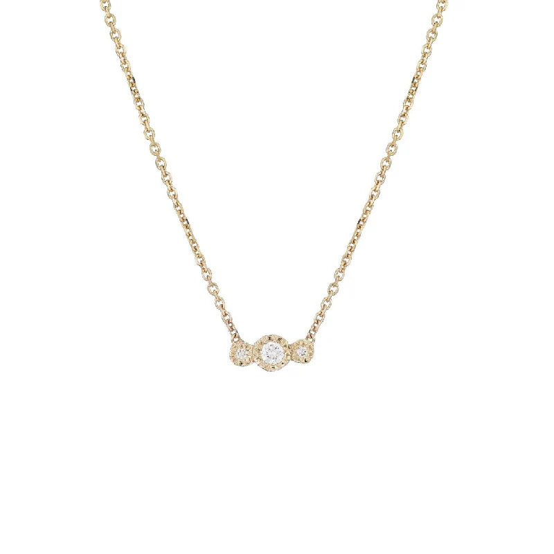 Gold necklace with 3 round brilliant cut diamonds