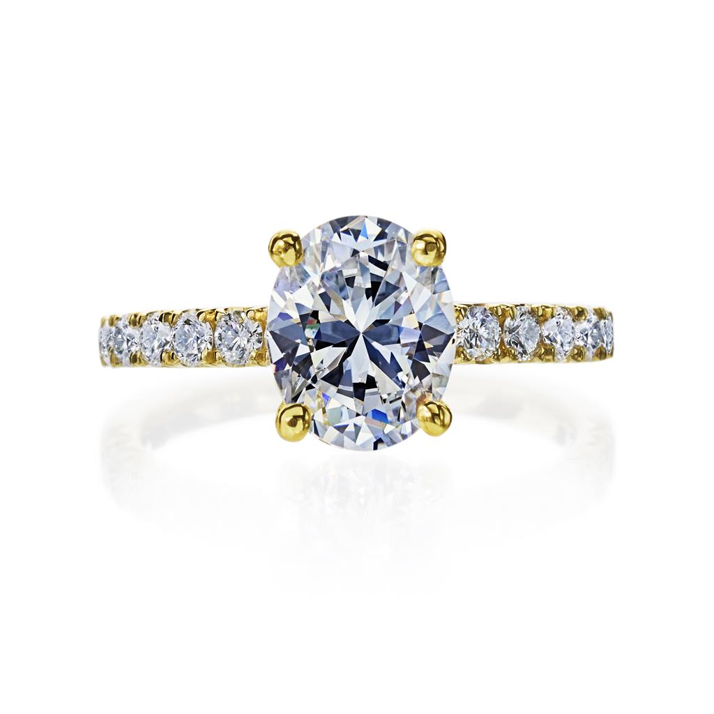 top view of gold solitaire diamond band ring