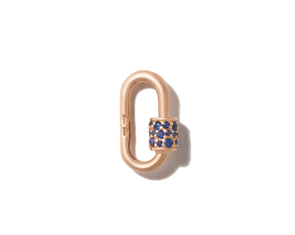 gold lock with blue sapphires