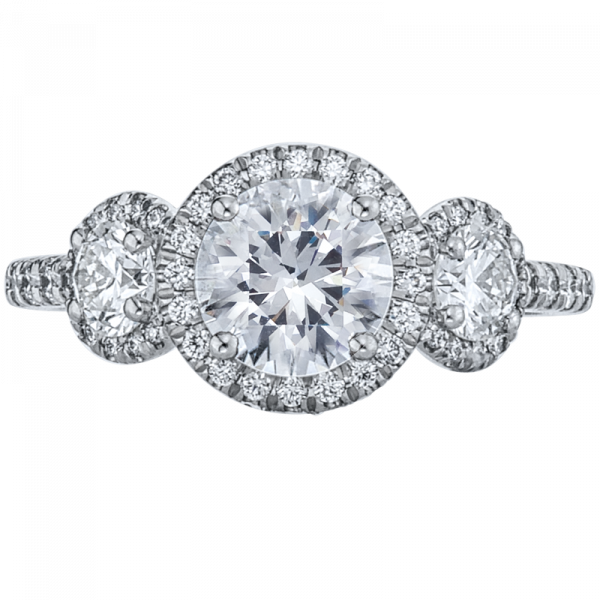 top view of Micro-pave set three-stone platinum engagement ring with 55 round brilliant cut diamonds weighing 0.70 carats. 