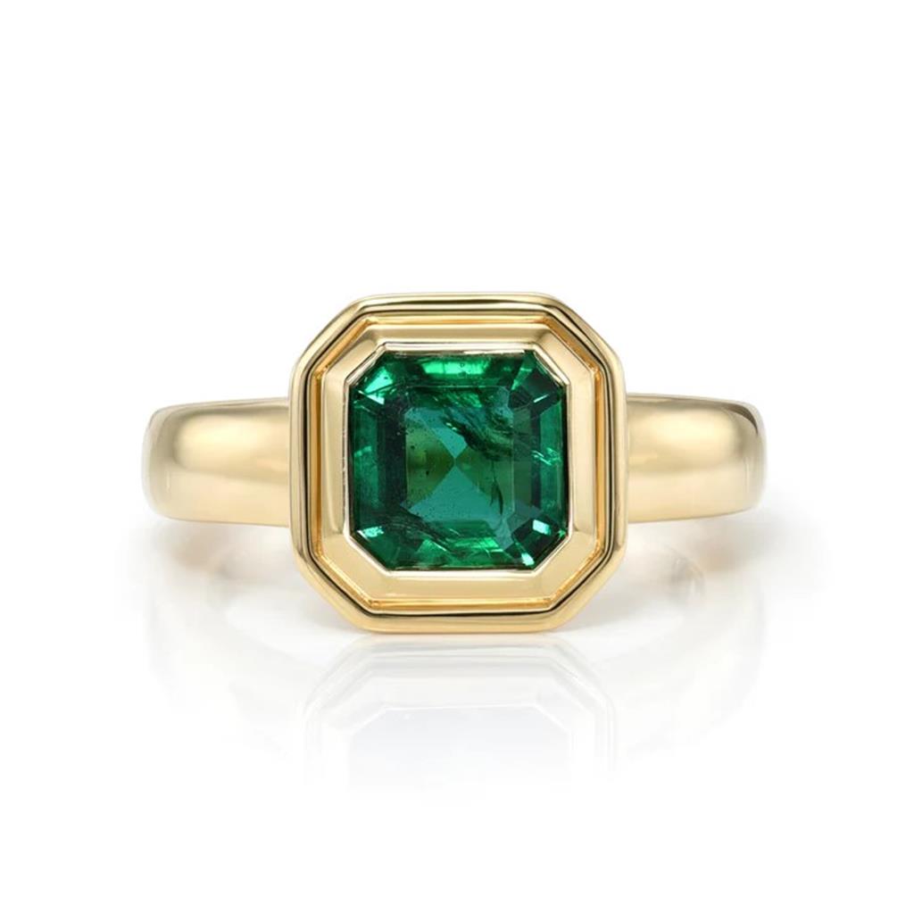 gold ring with octagon shaped emerald