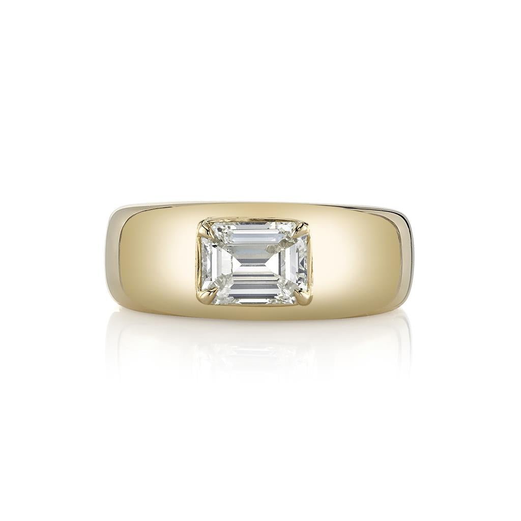Gold ring with rectangle cut diamond in center