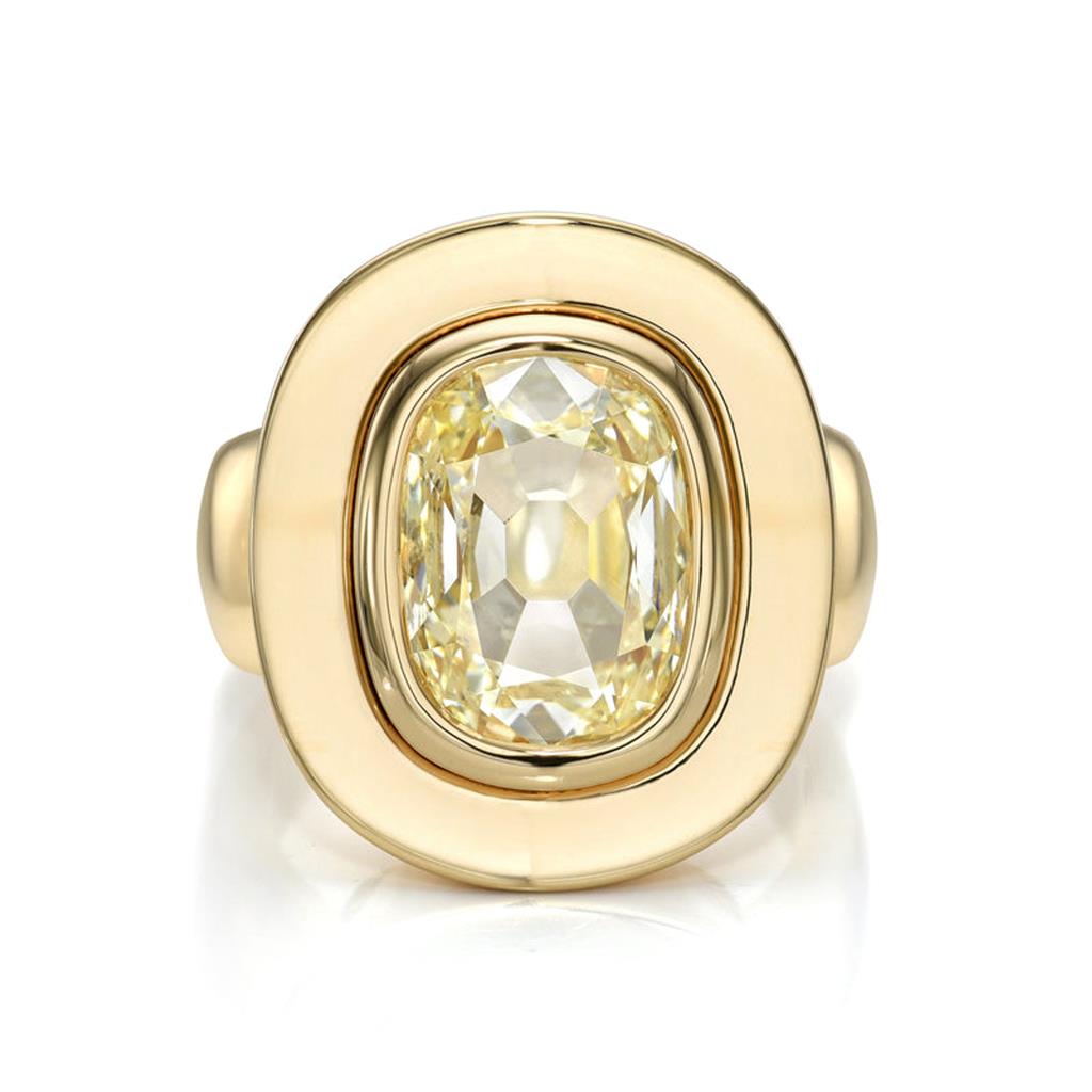 Large oval diamond ring with gold cushion