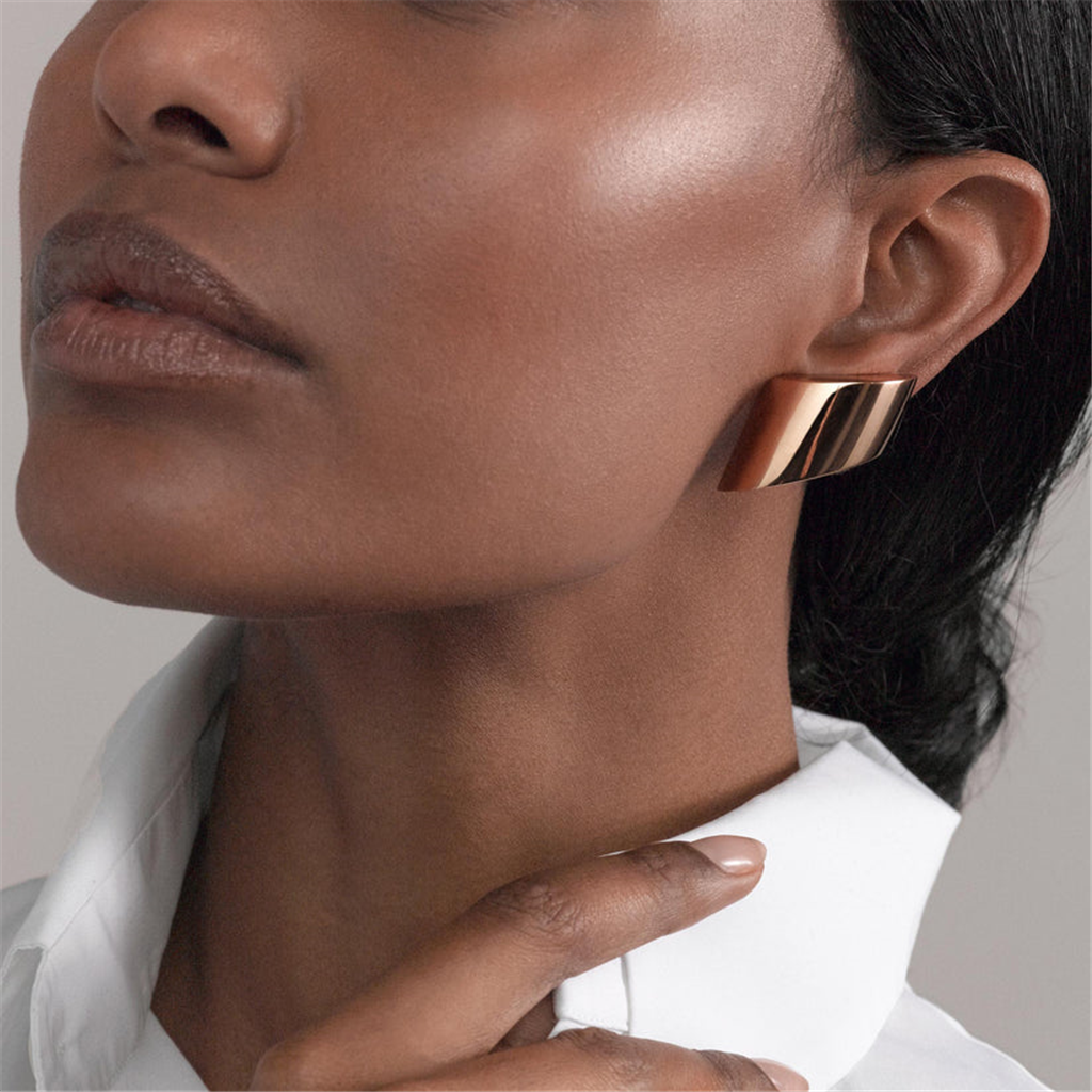 model wearing rose gold earclips