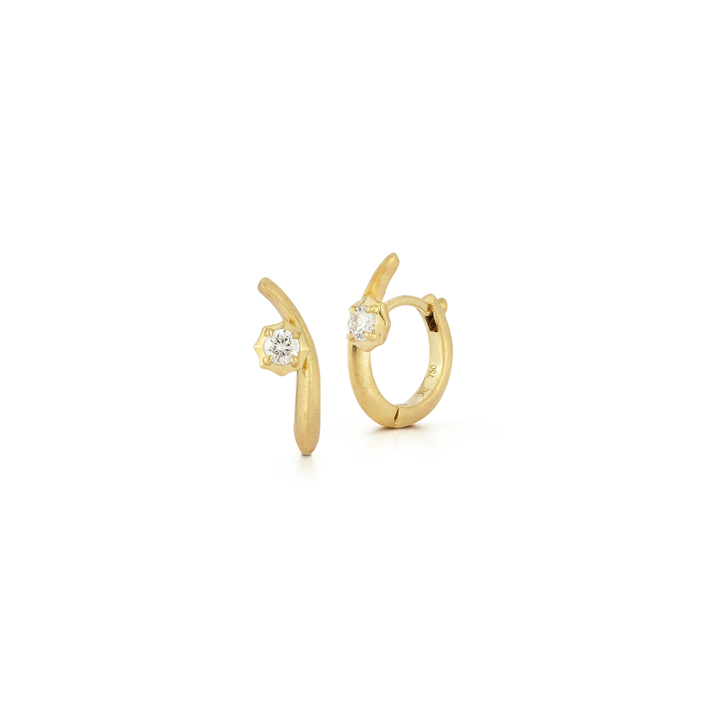 gold huggy earring with round diamond